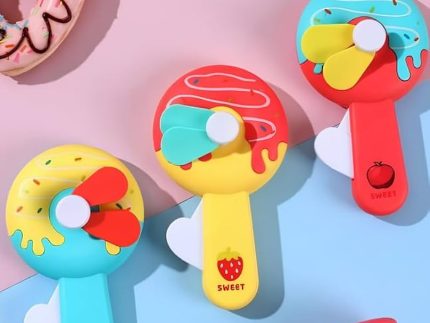 Donut Kid Fan – Cute Handheld Mini Fan for Kids | Portable Cartoon Fan for School, Travel & Outdoor Use (Random Color)